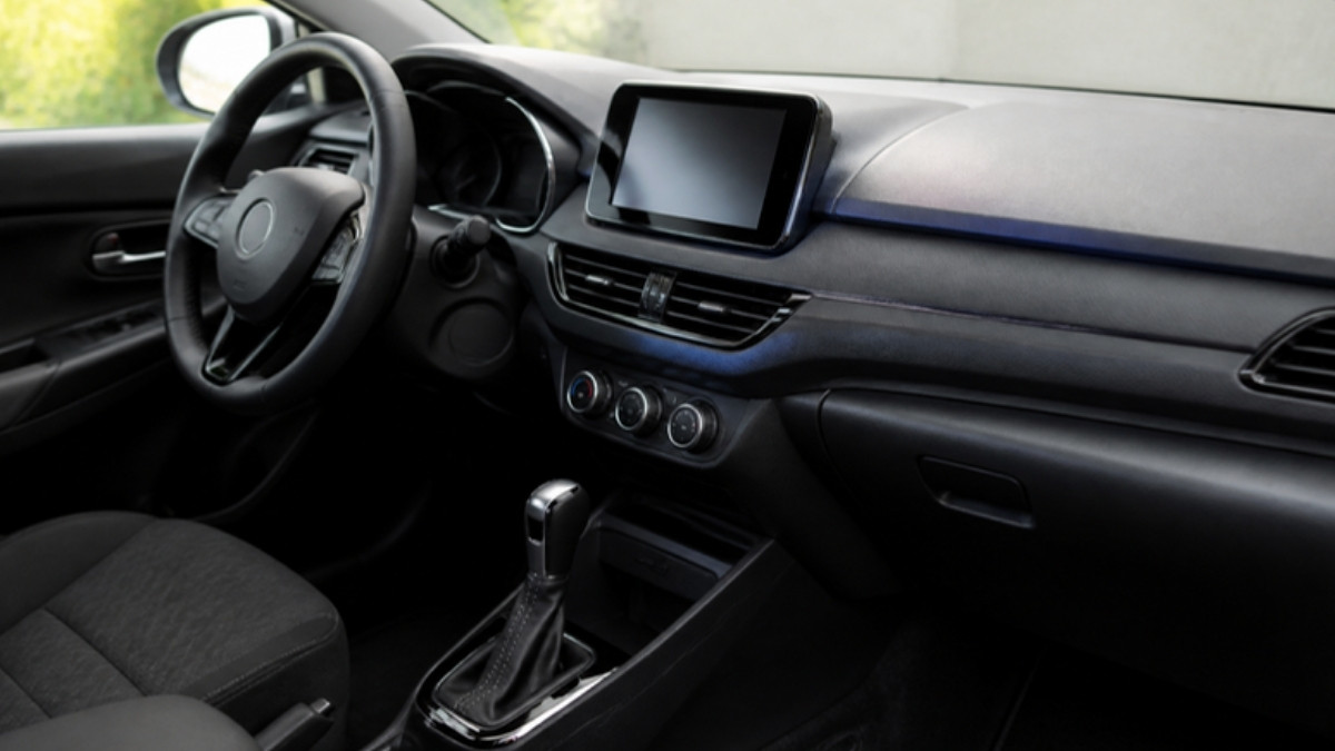Toyota Yaris interior dashboard with touchscreen and steering wheel